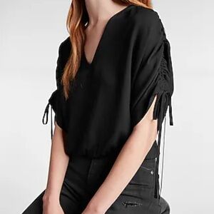 Express V-neck Tie Sleeve Banded
Visit Bottom Top